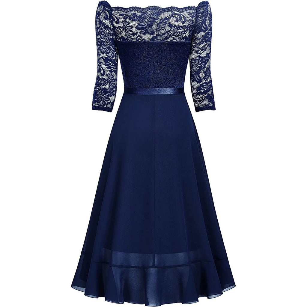 Navy blue lace dress with a white background