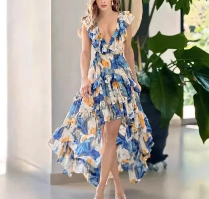 Woman wearing a blue floral dress - The Tottos
